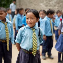 Sanju Rai, 9, during the morning assembly in the school in Nepal